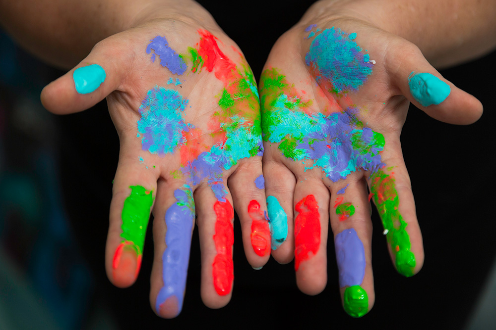 Pamela-with-Painted-Hands-resized